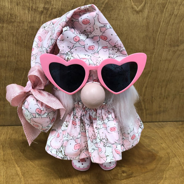 hand crafted pink piggy gnome with crocs & matching sunglasses.