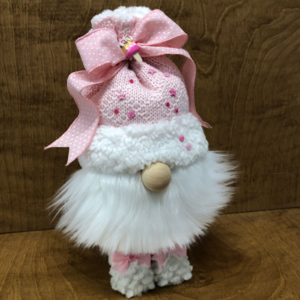 hand crafted whimsical pink gnome, candy, bows and matching boots.